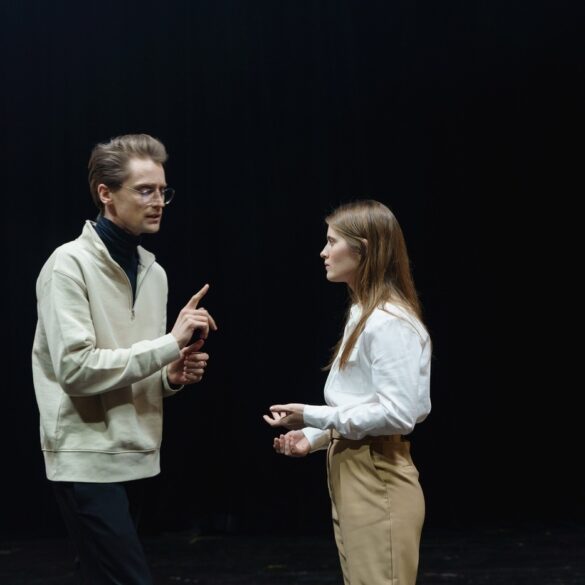 man and woman on a stage