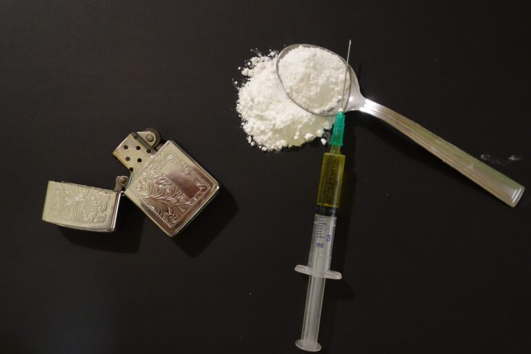 heroin with spoon and syringe