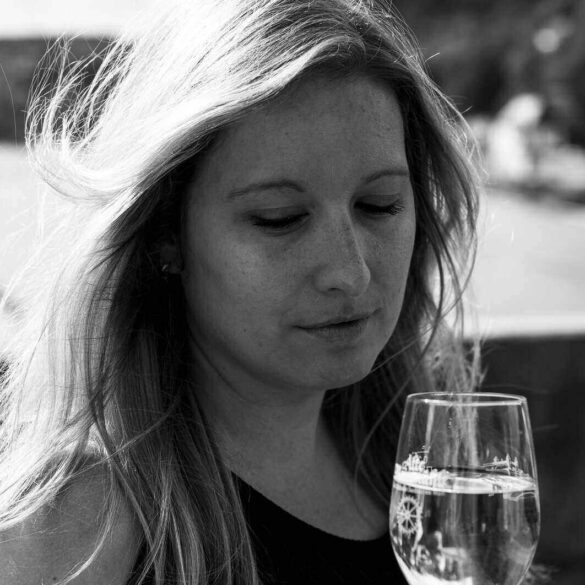 Young woman drinking wine