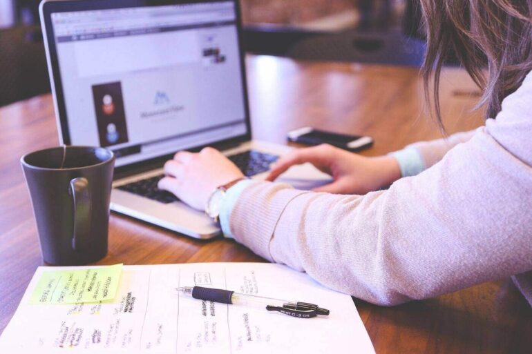 Young woman working on laptop