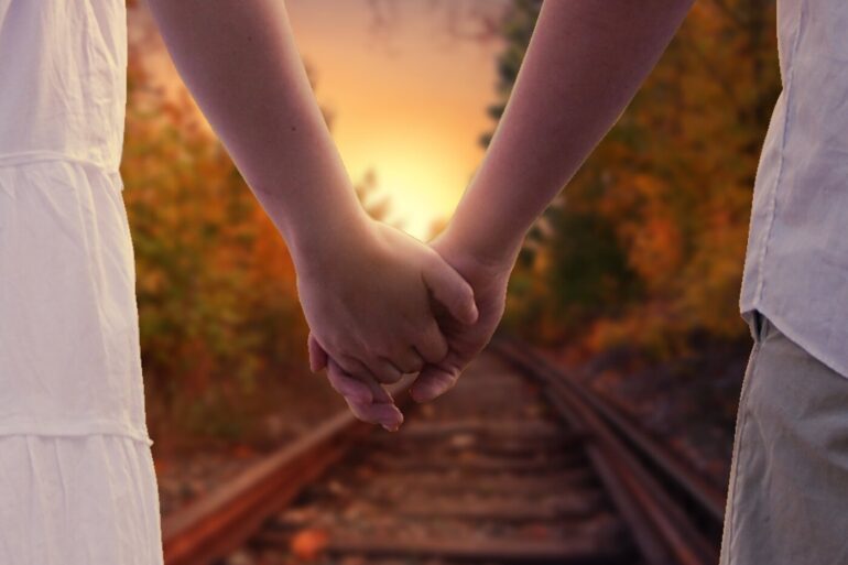POEMS BY MIKE LARCOMBE: Depression, The Best Is Yet to Come, By the Way 14 Couple holding hands, walking towards sun on train track