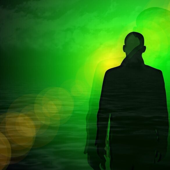 Silhouette of man, representing the soul, on green background