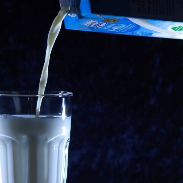 Milk being poured into glass