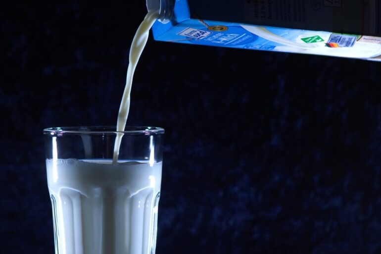 Milk being poured into glass