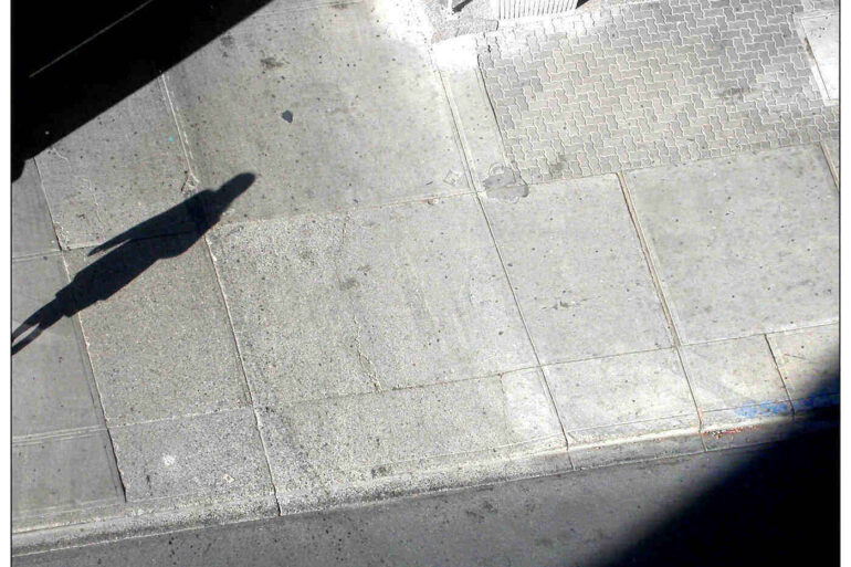 A GRIM TRUTH: Living with a child with anorexia 13 Shadow of a woman on a pavement