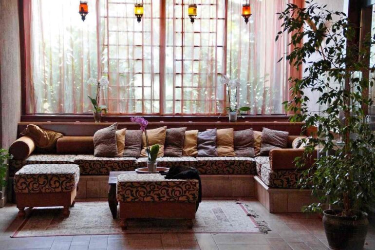 Nook with pillows, plants, lanterns