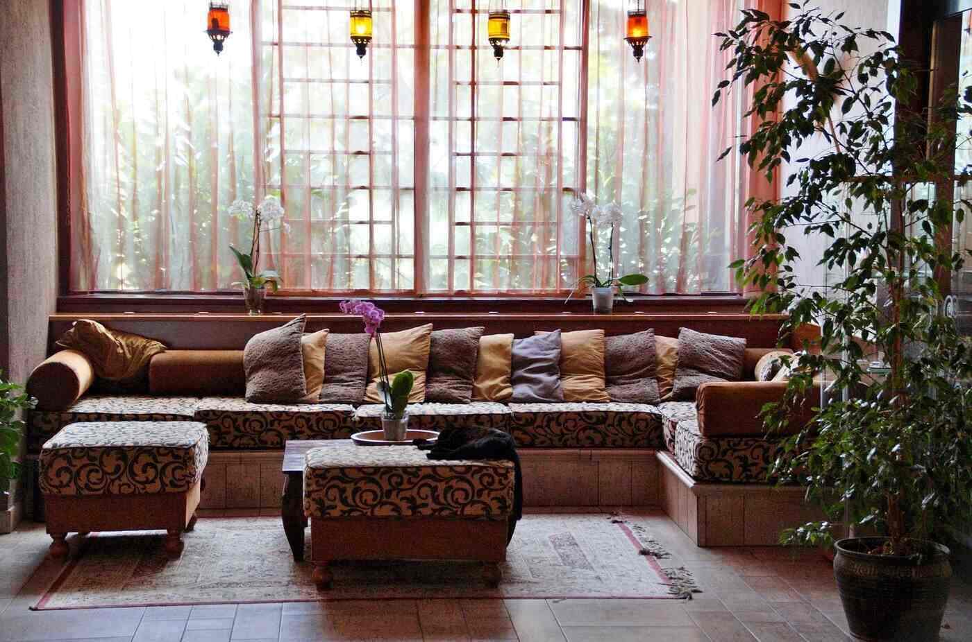 YOUR SELF-CARE AND MEDITATION SPACE: 10 tips for creating a cozy one in any home 13 Nook with pillows, plants, lanterns