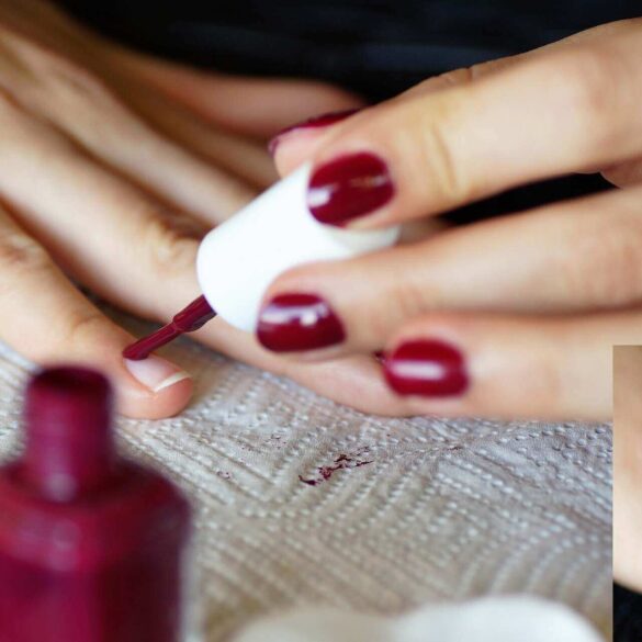 hands removing nail polish