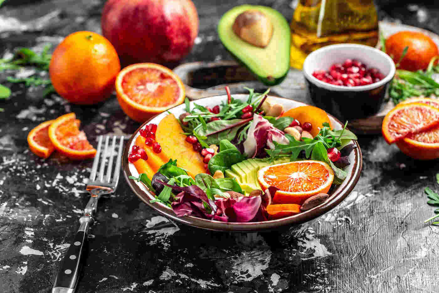 FRUITS AND VEGGIES: 5 ways mindfully consuming them will enhance your health 13 Salad with fruits and veggies on table