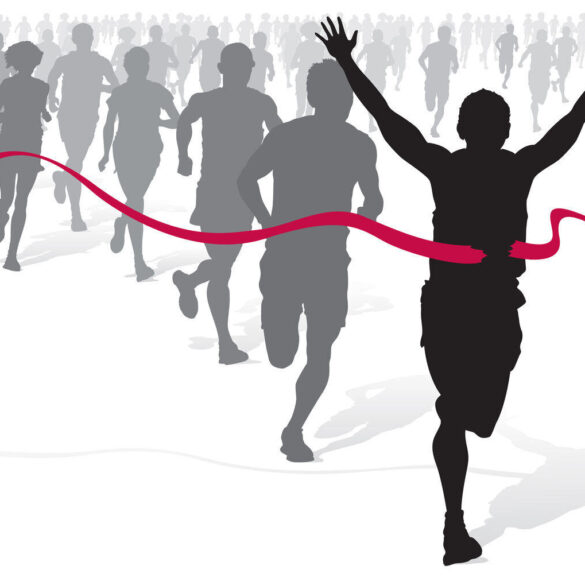 Silhouettes of people in running race