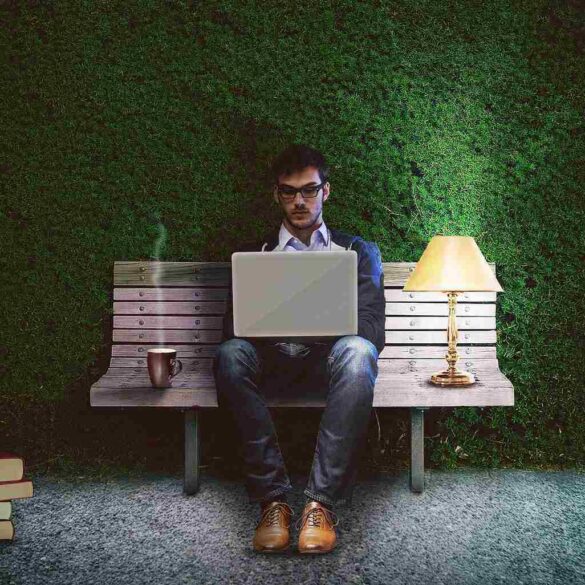 young man creating an outdoor office