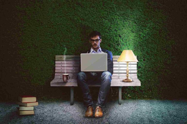 young man creating an outdoor office