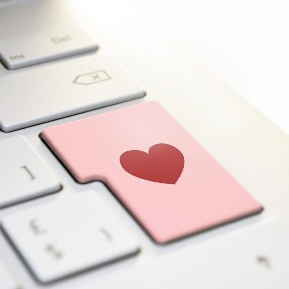 Laptop keyboard with heart as enter key