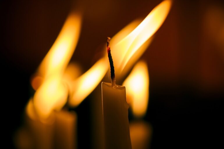 White candle being burned