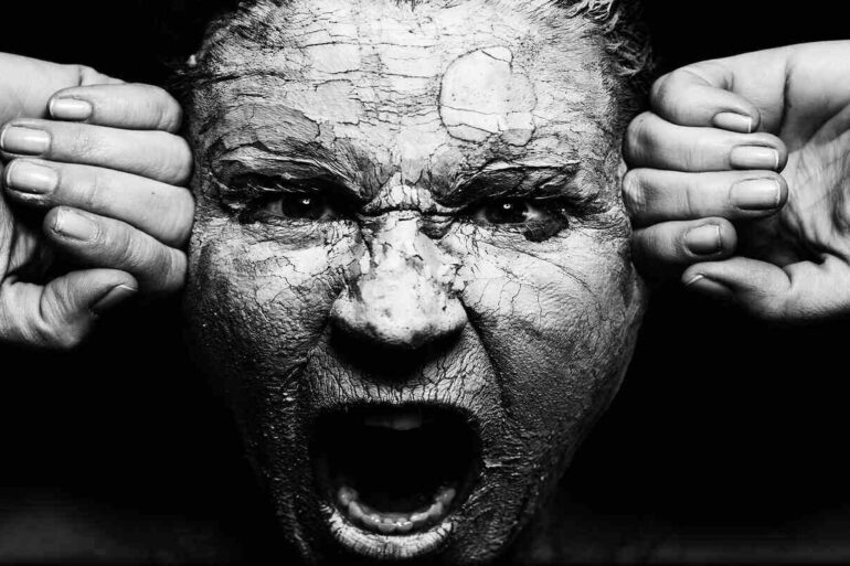 womans angry face screaming