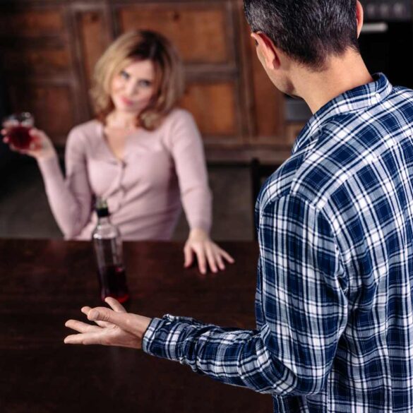 Man annoying with drunk wife