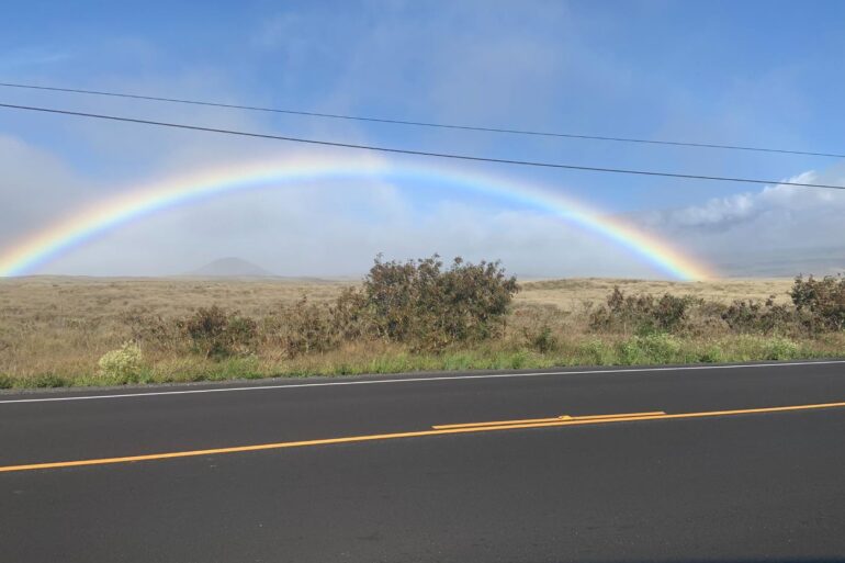 Rainbow in front of Mauna Kea volcano