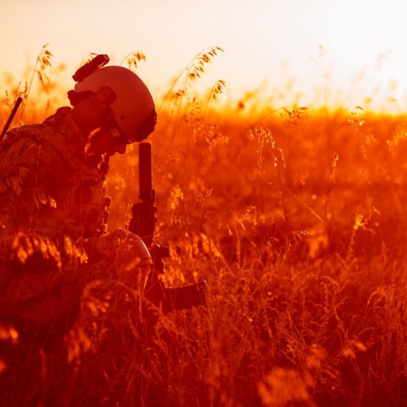 American soldier in field - 6 meditation practices for veterans to explore