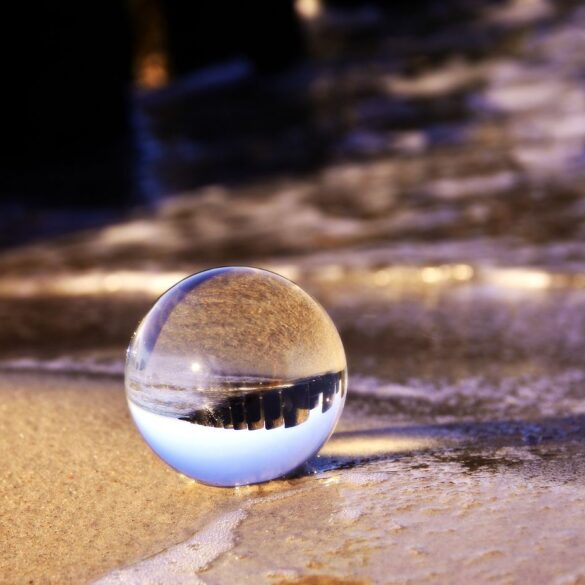 Transparent bubble on beach showing reflection of beach - 4 Poems About Spiritual Possibility, Including ”What We Want”