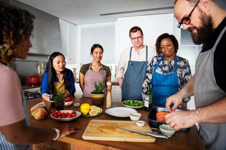 Group of adults taking cooking class