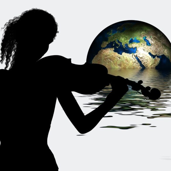Silhouette of woman playing violin to Earth floating in water - Wild Yoga Exercises to Help You Join the Earth’s Symphony