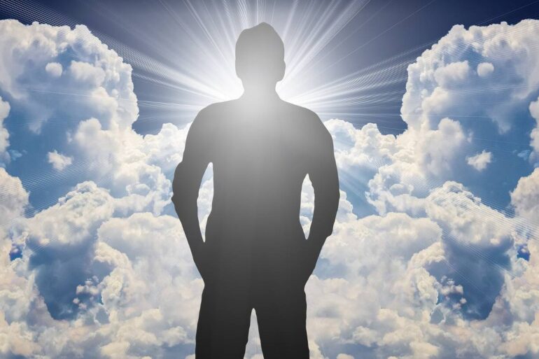 Meditative silhouette in front of clouds - The 40-Day Challenge: Meditate on Your Fear of Death for 40 Days