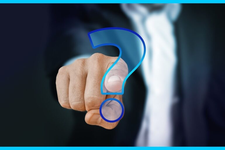 man's finger pointed accusingly toward a question mark - Stoicism and the "Let Them Theory"—Don’t Waste Precious Time