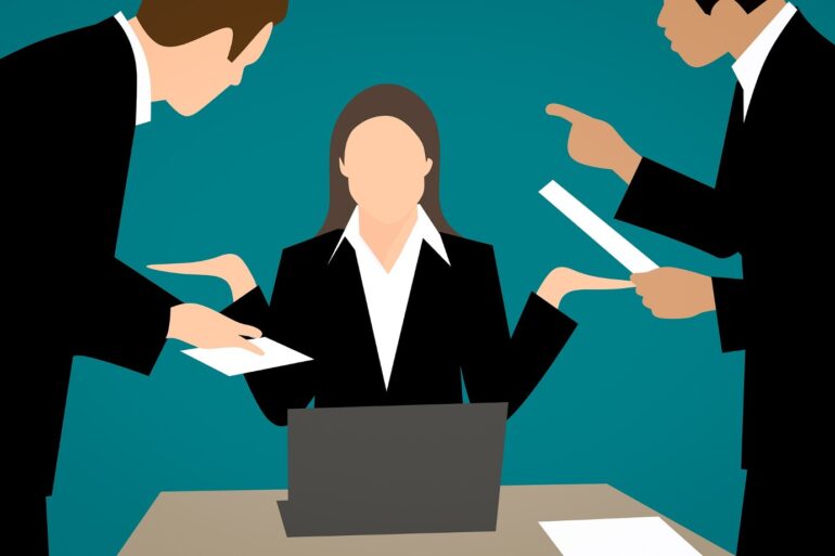 Illustration of one angry businesswoman at desk with two angry businessmen yelling at her - MINDFUL BUSINESS LEADERSHIP: 3 crucial communication practices