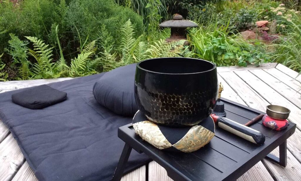 Meditation cushion and other accessories in Zen garden - On Pain: Reflections After a Week With 2 Painful Root Canals