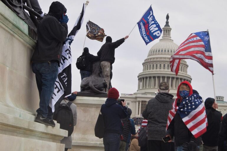 Trump supporters storming the U.S. Capitol on January 6, 2021 - Buddhist Psychology: Can It Solve America's Social Problems?