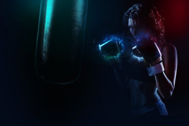 woman boxer alone in a gym - Boxing Is My Yoga—It Promotes Self-Awareness and Brain Care