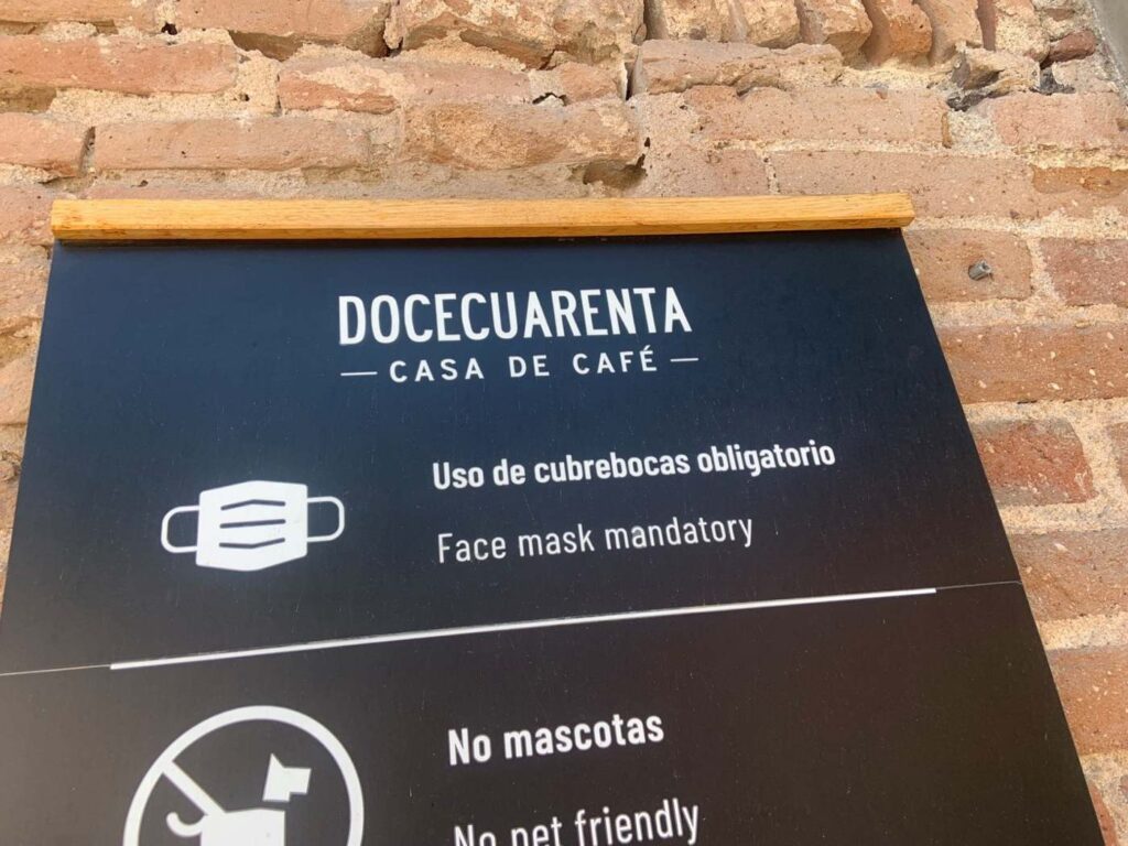 Sign for Docecuarenta, upscale coffeehouse in La Paz
