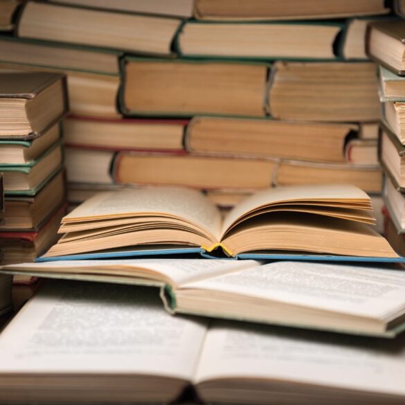 Stacks of old books - Stoicism Poems: How Do Modern Stoics Truly View Poetry?