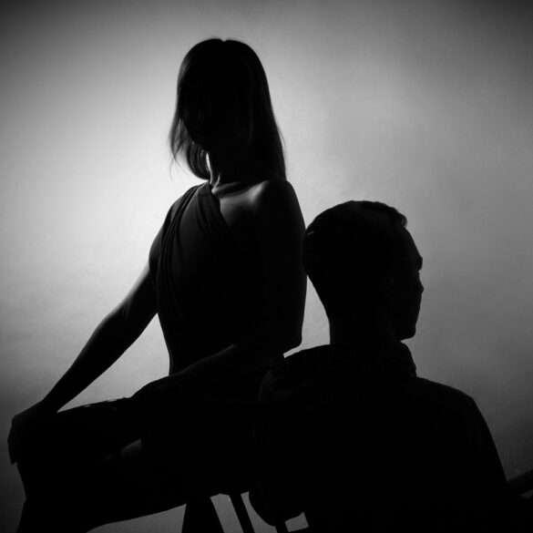 Silhouette of couple having disagreement