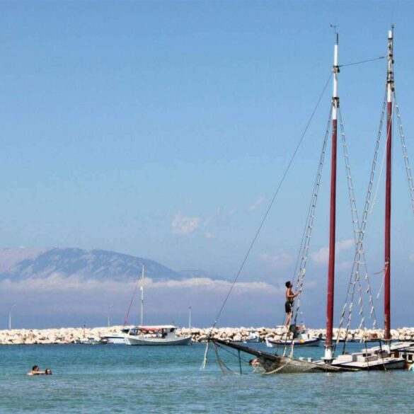 Two-mast sailboat sinking