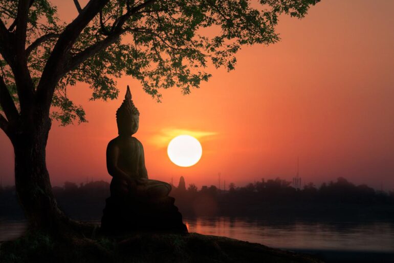 PAIN AND THE JEDI OF MINDFULNESS: How does meditation affect our relationship with pain? 21 Statue of Buddha meditating at sunset - How Does Meditation Affect Our Relationship With Pain?