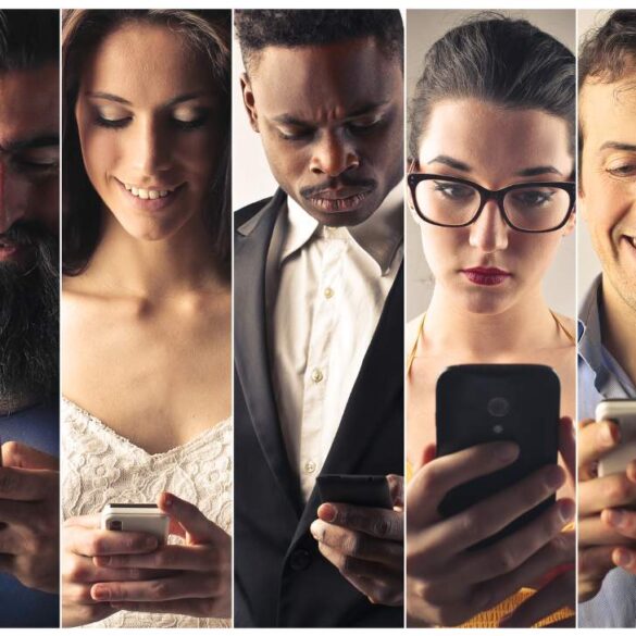 Seven adults using smartphones