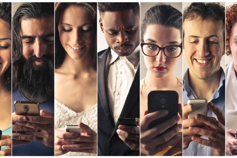 Seven adults using smartphones