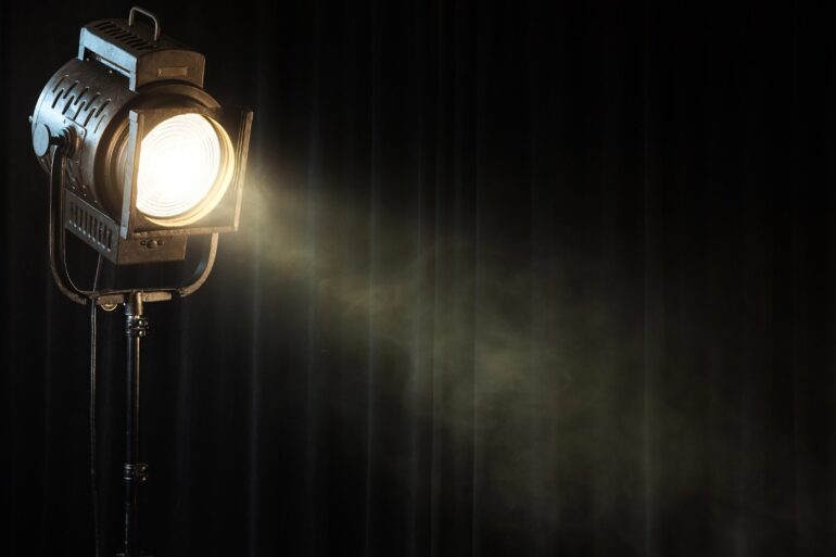 SPOTLIGHT SYNDROME: Stop "firing" yourself—no one's watching as closely as you think 15 Single spotlight shining onto a stage