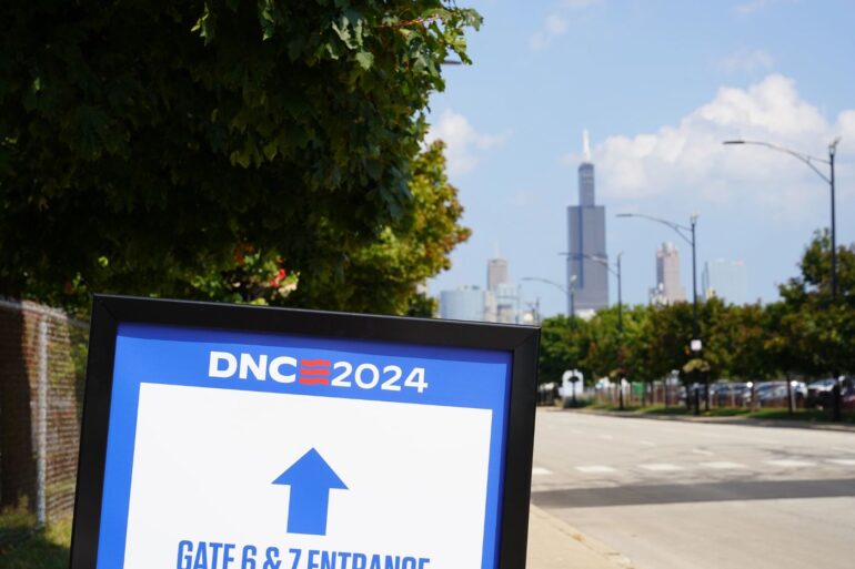 Sign outdoors at Democratic National Convention (DNC) 2024 - America’s Foundational Values: Is Harris Our Guiding Light?