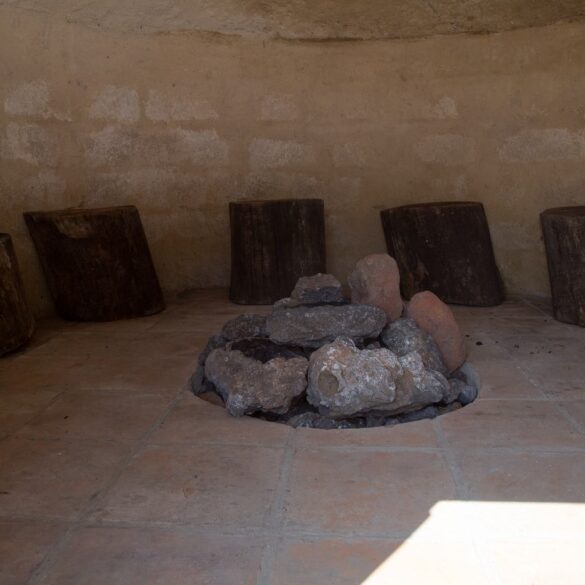 Tree stumps around a pit for a Mayan woodless fire -The Mayan Fire Ceremony: 4 Circles of Spiritual Growth