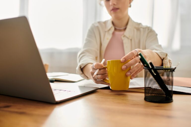Woman calmly sitting at desk in home office - Your Work: A Gift and a Privilege in the Present Moment