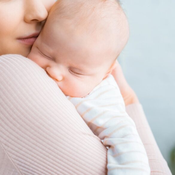 Mother with new baby - Finding Hope: How to Overcome Your Postpartum Struggles