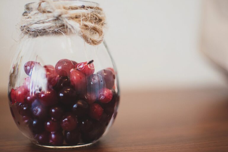 Jar of cranberries - Mindful Beauty: 5 Steps to Filling Your Jar of Happiness