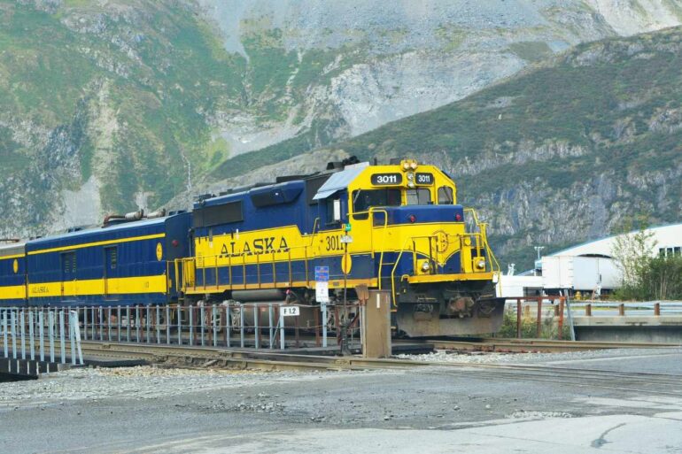 Train travelling through Alaska mountain range - Don’t Doubt Yourself—Spread Your Wings and Soar