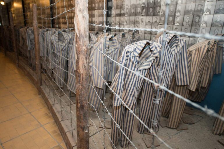 Old uniforms at former Auschwitz prison camp - The Value of Creating Space: Lessons From Auschwitz Survival