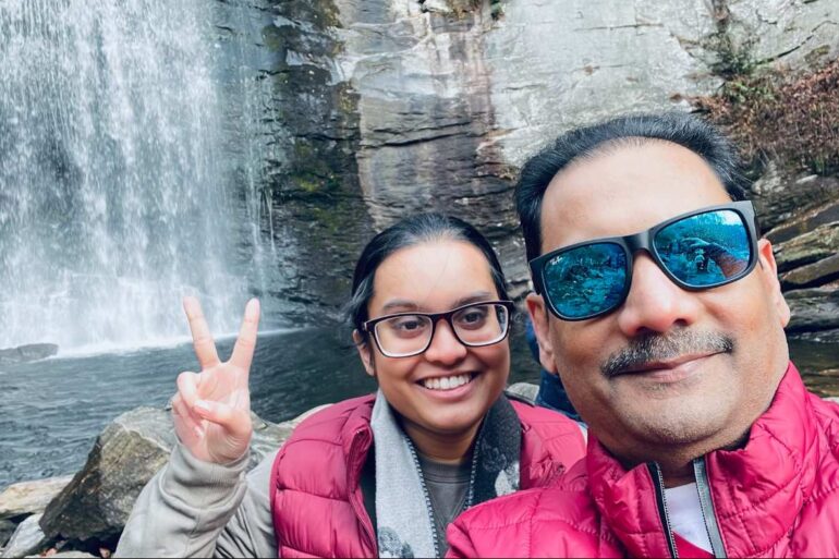 Looking Glass Falls in North Carolina - Samia Mehbub and father in front of falls