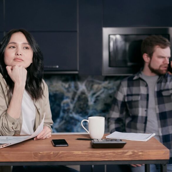 Annoyed couple using cell phones - The Middle Ground: How to Avoid Oversharing on Social Media