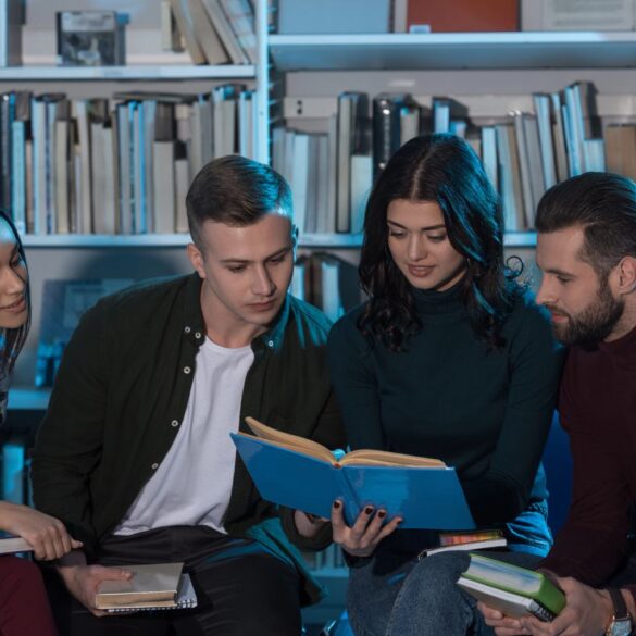Four young adults reading books together - Bibliotherapy: A Unique and Helpful Therapy Technique