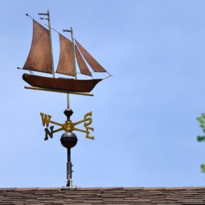 Sailboat-shaped weathervane on a roof - Mindfulness Practice Is Worth It—Despite the Hidden Cost